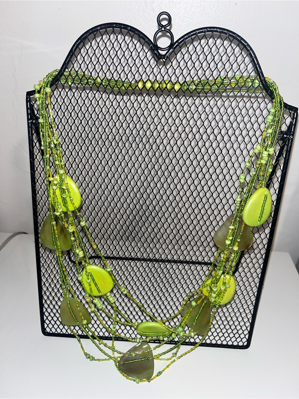 Green multi-strand layered beaded glass